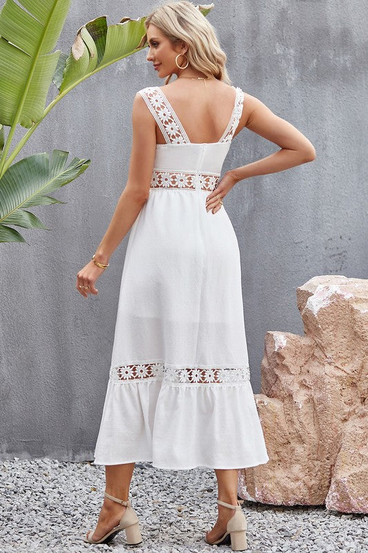 Back view of Tory Midi Dress in white, sleeveless with zipper closure and classic midi silhouette.