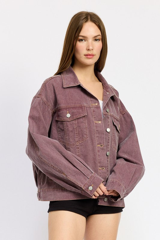 A straight-on shot showcasing the classic button-down front, collared neckline, and vibrant berry hue of this must-have denim piece.