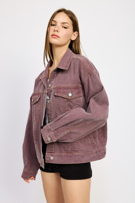 A dynamic perspective highlighting the rich berry color, structured fit, and classic denim jacket elements for a fresh, modern twist.
