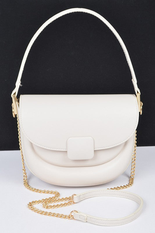 Front view of Quinn Convertible Shoulder Bag in white vegan leather with gold hardware.