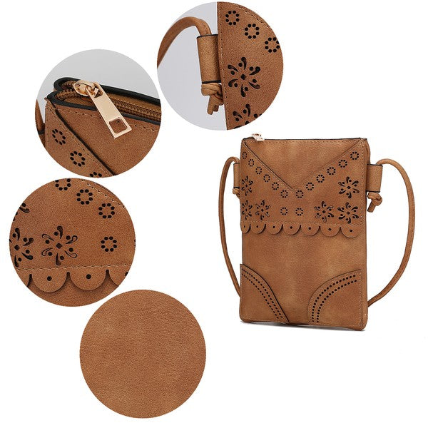 Beige Amentia Crossbody detail close-up showing gold zipper and intricate cutouts.