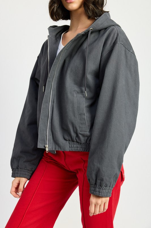 Bryn Denim Hoodie in charcoal, close-up highlighting zipper front and pocket detail