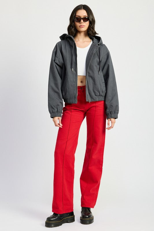 Bryn Denim Hoodie in charcoal, full body styled with red pants and sneakers