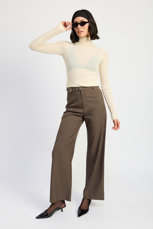 Full body view of Tricia ash-brown straight-leg trousers with adjustable gold buckle waistband, styled with heels.