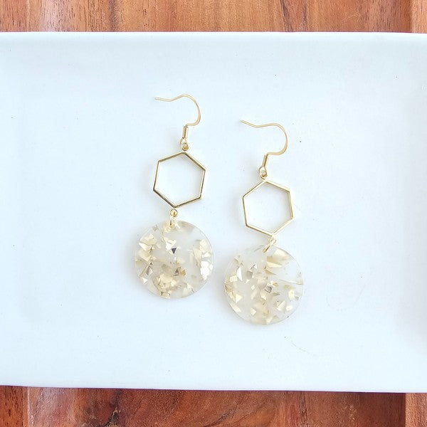air of Layla Hexagon Acrylic Drop Earrings displayed on white background with gold hexagon charms and sleek acrylic drops.