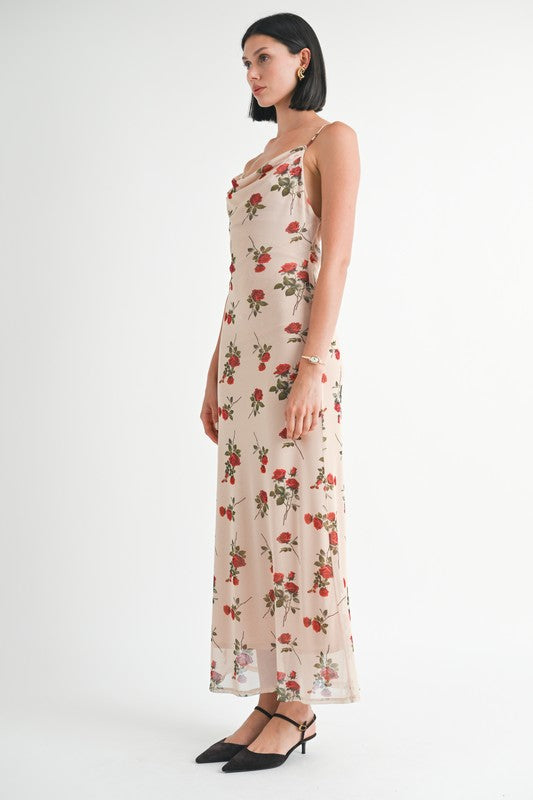 Side view of Rieka Rose Floral Maxi Dress showing open back and draped fabric.