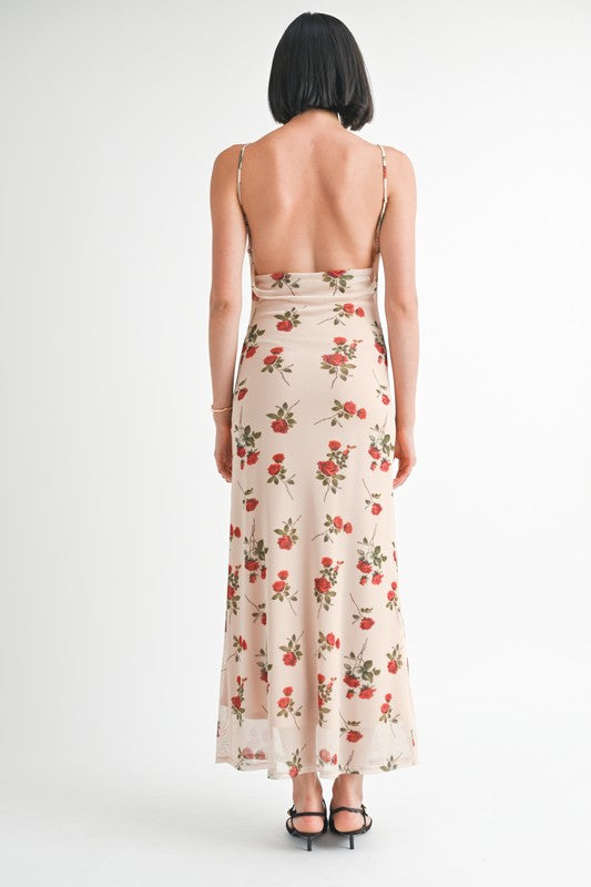 Back view of Rieka Rose Floral Maxi Dress with spaghetti straps and open back design.