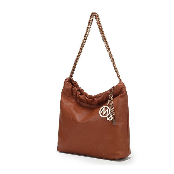 Cognac MKF Celestine quilted shoulder bag, gold chain strap, roomy interior.