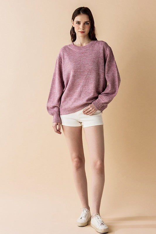 Plus side angle Light Rose heathered knit balloon sleeve sweater.