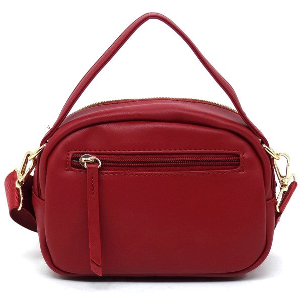 Back view of the red Cadie Top Handle Crossbody Bag with smooth vegan leather finish and gold-tone hardware