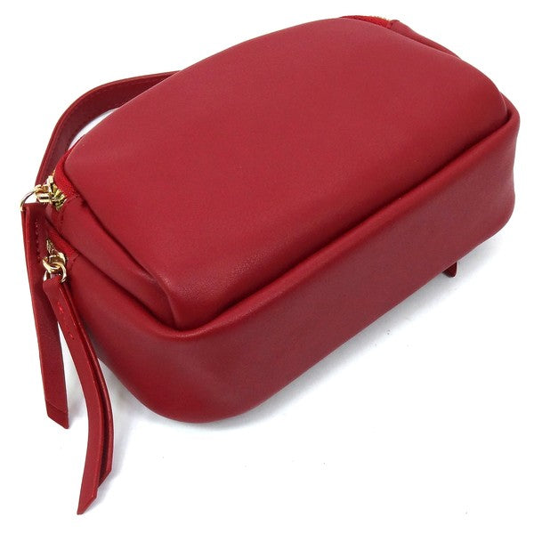 View of the red Cadie Top Handle Crossbody Bag showing width and structured base for stability