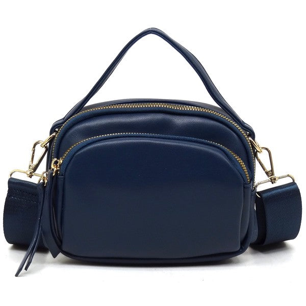 Front view of the blue Cadie Top Handle Crossbody Bag with gold-tone hardware and structured top handle
