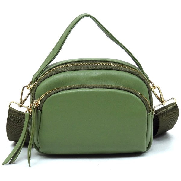 Front view of the sage Cadie Top Handle Crossbody Bag with gold-tone hardware and structured top handle