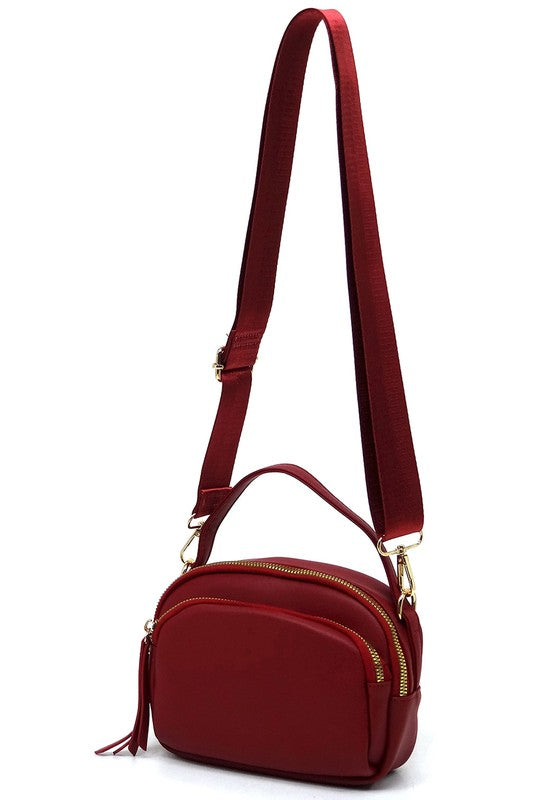 Red Cadie Top Handle Crossbody Bag with detachable shoulder strap attached, showing strap length and versatility
