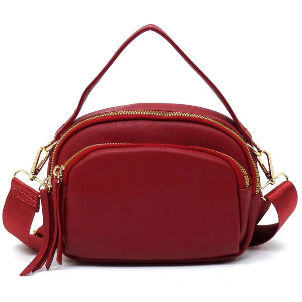 Front view of the red Cadie Top Handle Crossbody Bag with gold-tone hardware, structured top handle, and zip-top closure