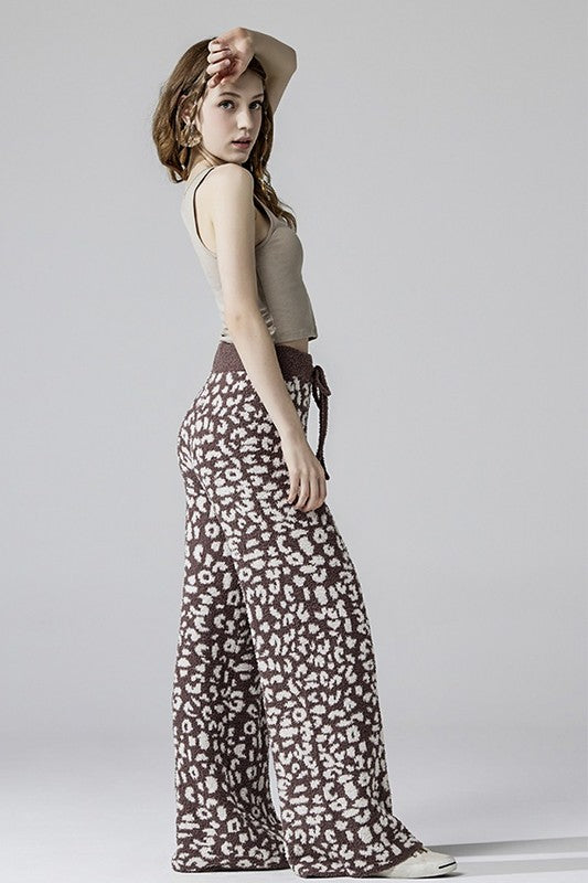 Aleah Plus Size Leopard Lounge Pants in coco with cream leopard spots, side view showing knit texture