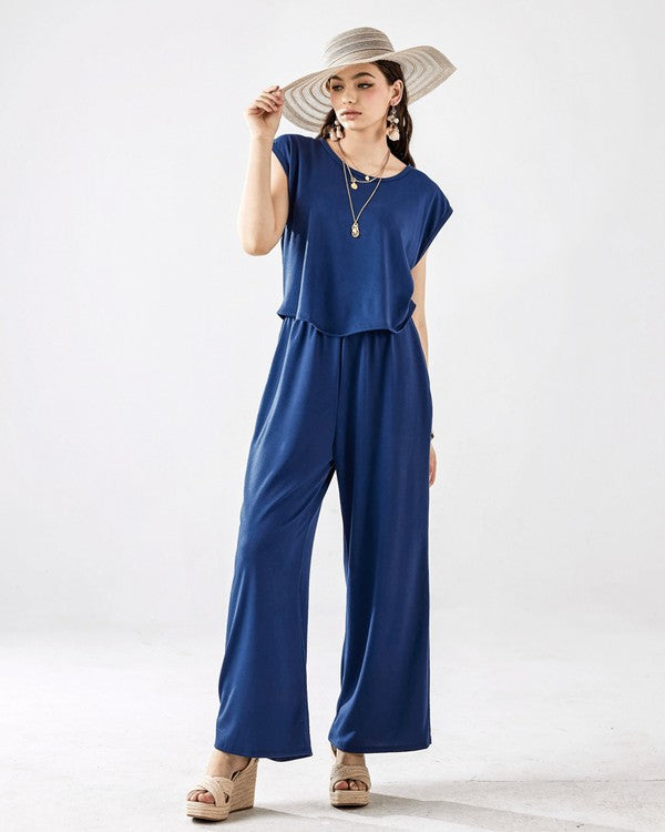 Front view of Kora Wide Leg Jumpsuit in navy showing relaxed fit.