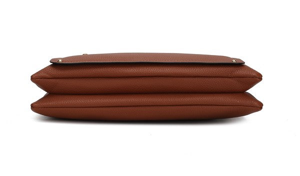 Bottom view of cognac/black Aliyah shoulder bag with reinforced seams.