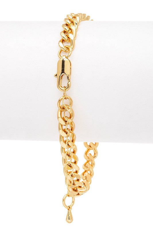 Close-up of gold Melida Medallion Charm Bracelet showing lobster claw clasp closure.