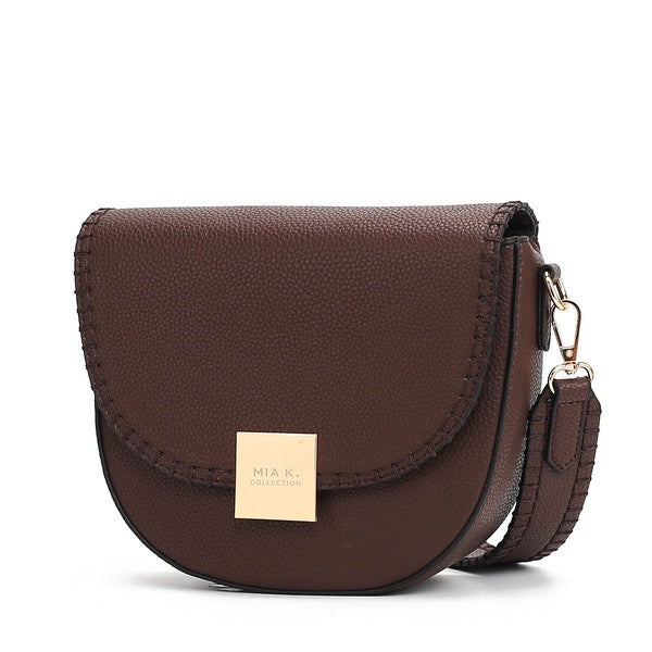 Coffee Isa crossbody bag with adjustable strap and smooth vegan leather finish.