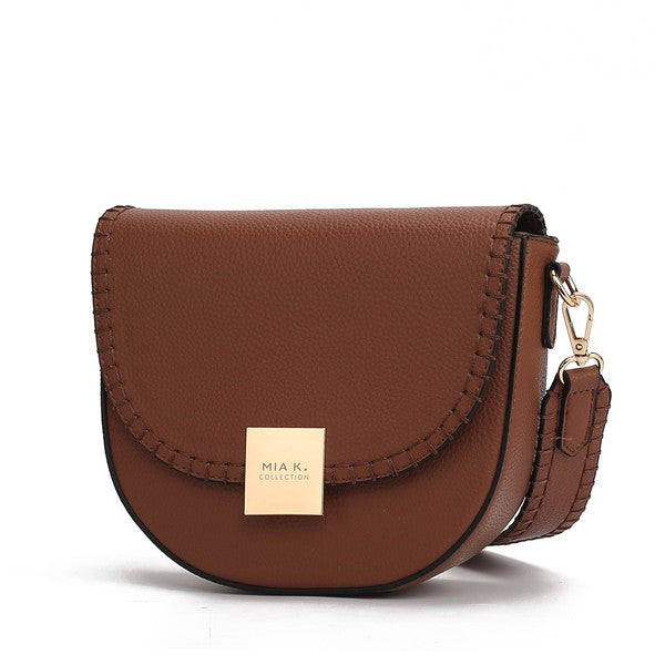 Cognac Isa crossbody bag with sleek gold-tone hardware and compact shape.