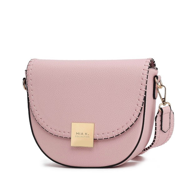 Pink Isa crossbody bag with gold-tone hardware and smooth vegan leather.