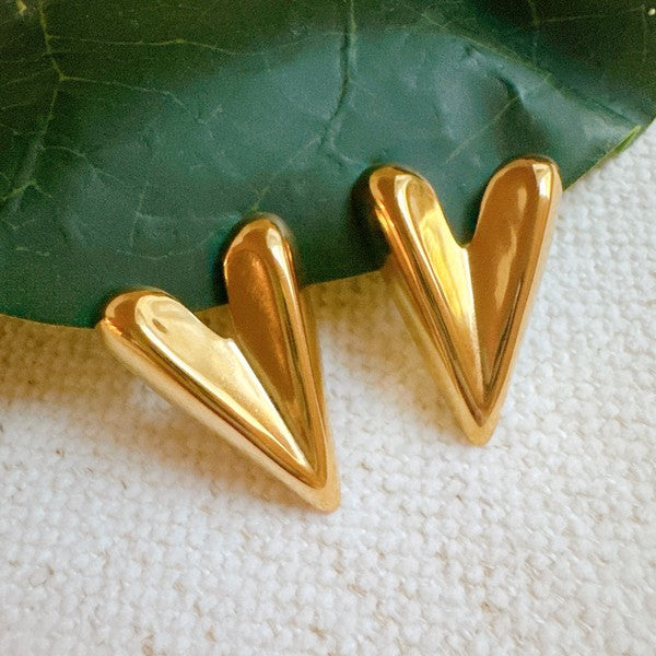 Hey Love Heart Stud Earrings in 18k gold-plated stainless steel, measuring approximately 1 inch by 0.8 inches, featuring a bold heart design, water and tarnish resistance, and lead- and nickel-free construction.