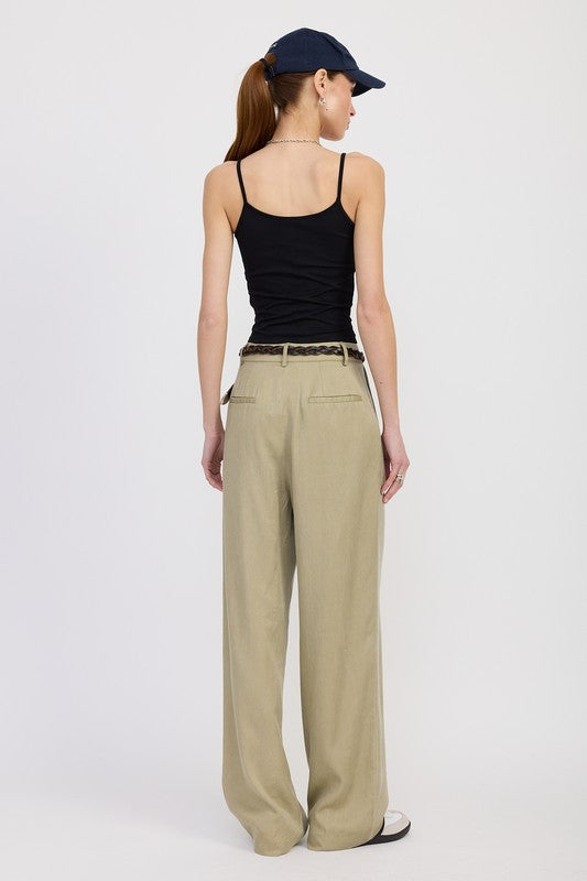 Back view of Poppy High Waist Wide-Leg Trousers in tan with high waist and pleats