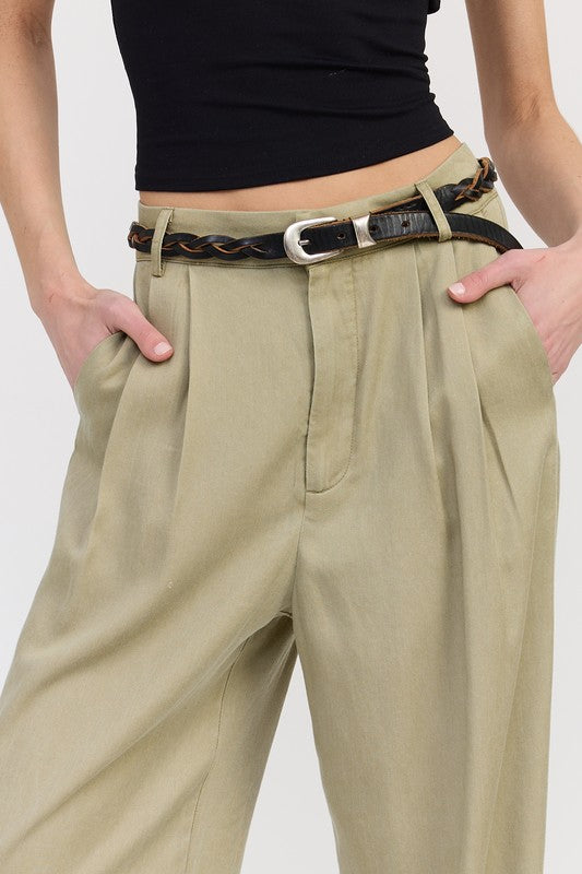 Close-up of Poppy High Waist Wide-Leg Trousers tan variant with high waist pleats