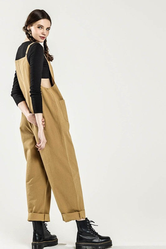 Dayana Plus Size Overall Jumpsuit in sand, side view highlighting button-down front