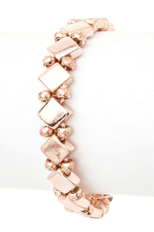 Vintage Inspired Stretch Bracelet in worn rose gold with diamond and circle beads, 0.4-inch width, and comfortable stretch fit.