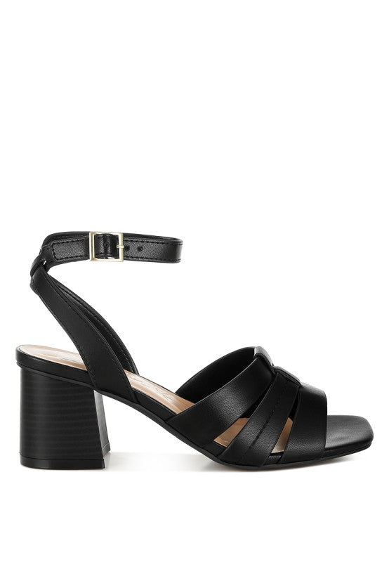 Side view of black Signora Ankle Strap Sandals with pin buckle ankle strap.