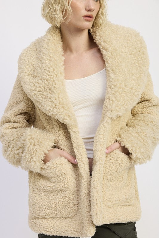 Close up of Zephyr Fleece Jacket in taupe highlighting faux fur trim and soft fleece texture