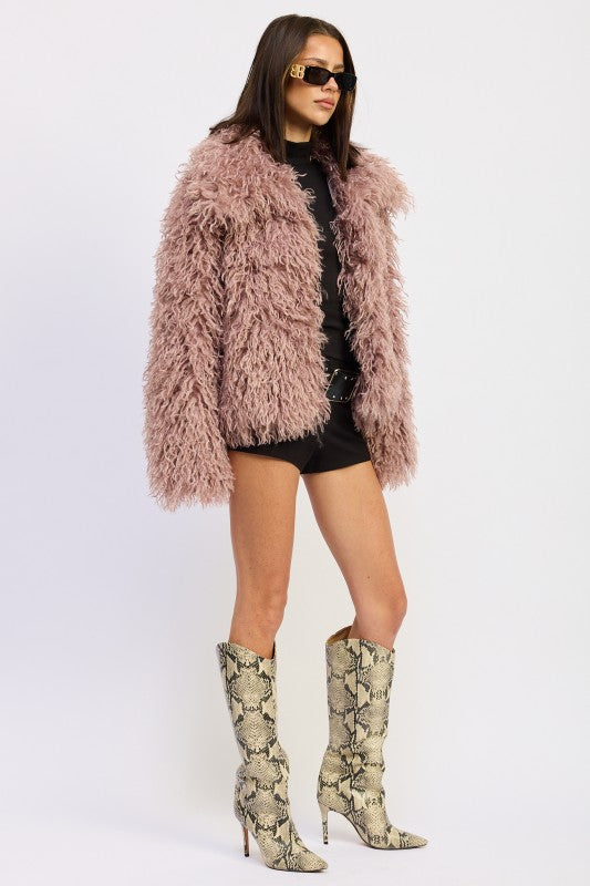 Side profile of the Chana Shaggy Faux Fur Coat showing oversized shaggy texture