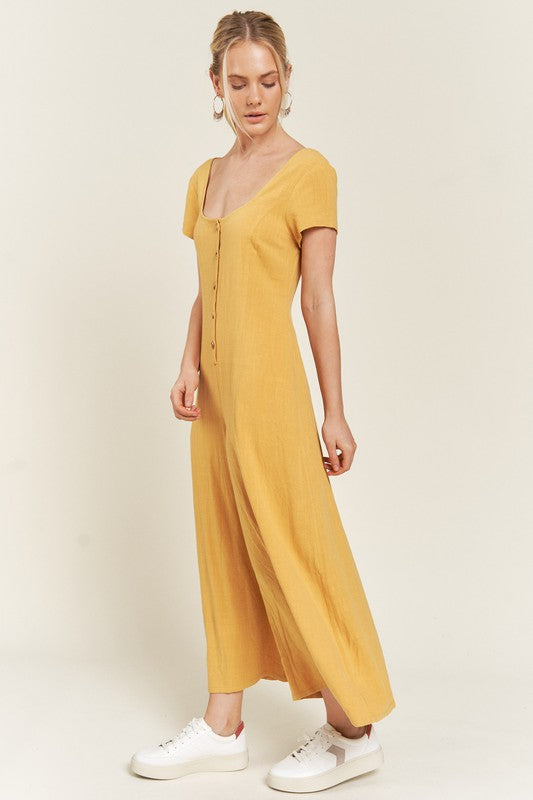 Mustard Seona Linen Plus Size Jumpsuit side view highlighting breezy cropped legs.