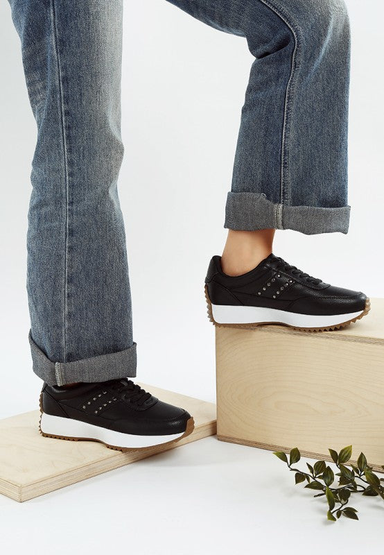 Athion Studded Leather Sneakers with studs and gum sole.
