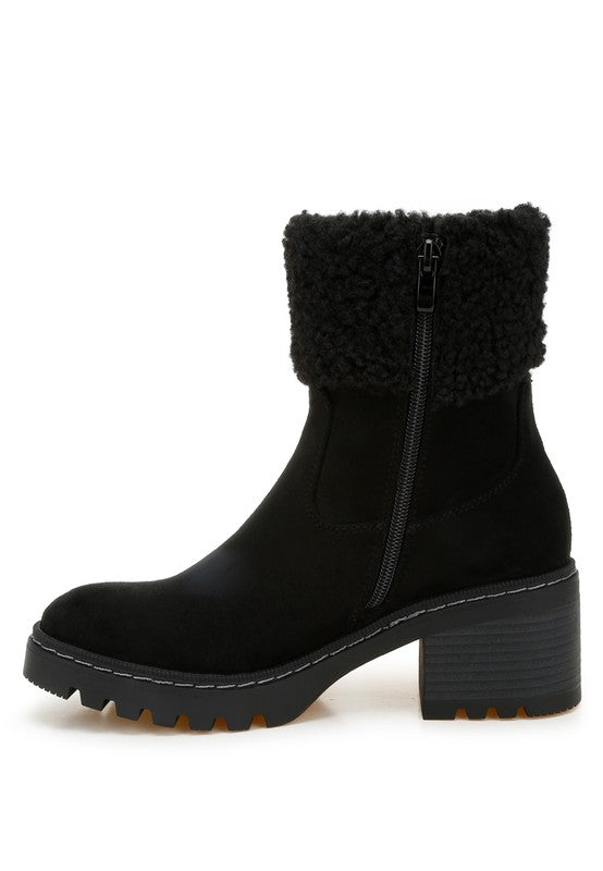 Side view of Black Woolly Faux Fur Embroidered Boots highlighting zipper closure and chunky heel.