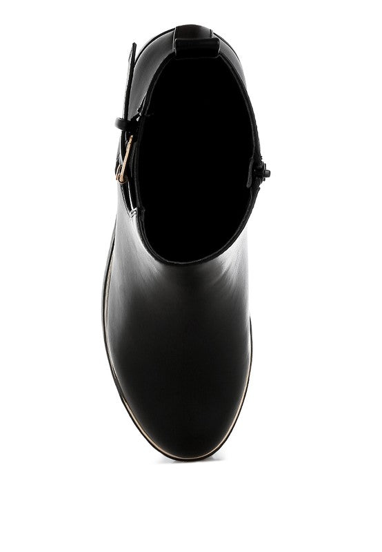 Top view of black Antorin chunky buckle ankle boots showing rounded toe and padded opening.