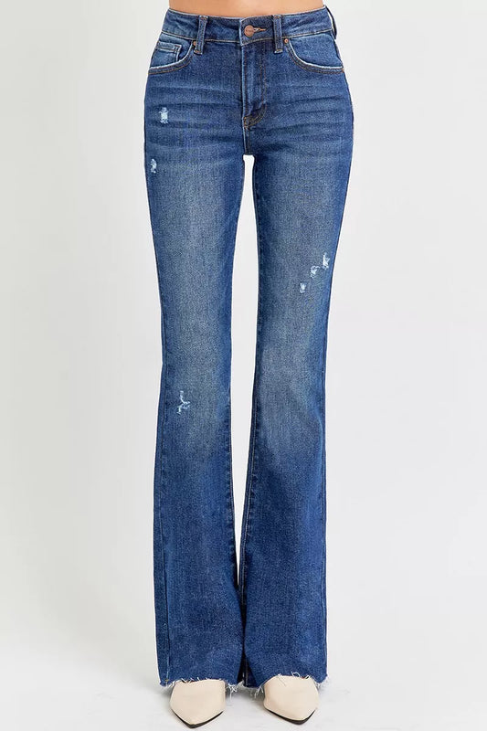 Close up of Jax Flare Jeans mid rise waist and distressed detailing