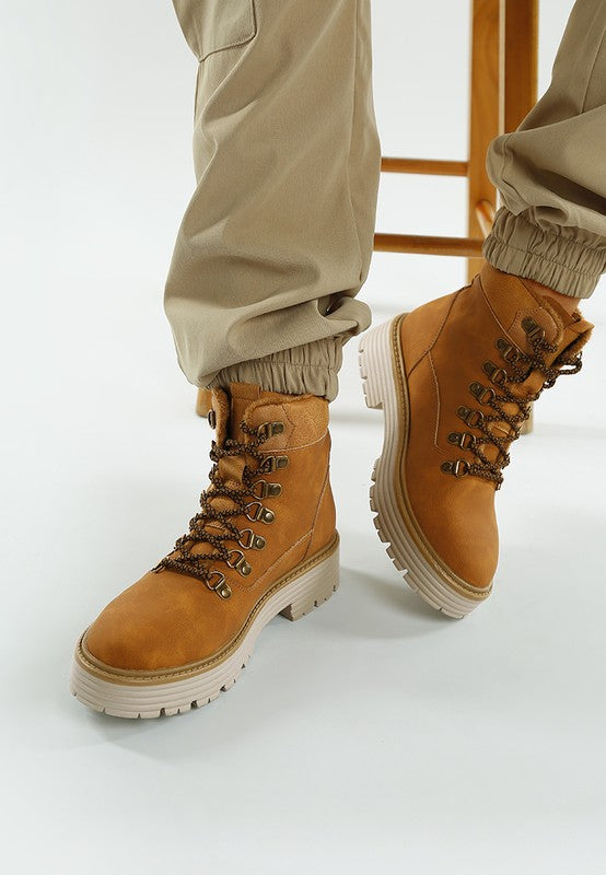 View of Tan Boskoff Lace-Up Chunky Ankle Boots highlighting 2-inch block heel and platform.