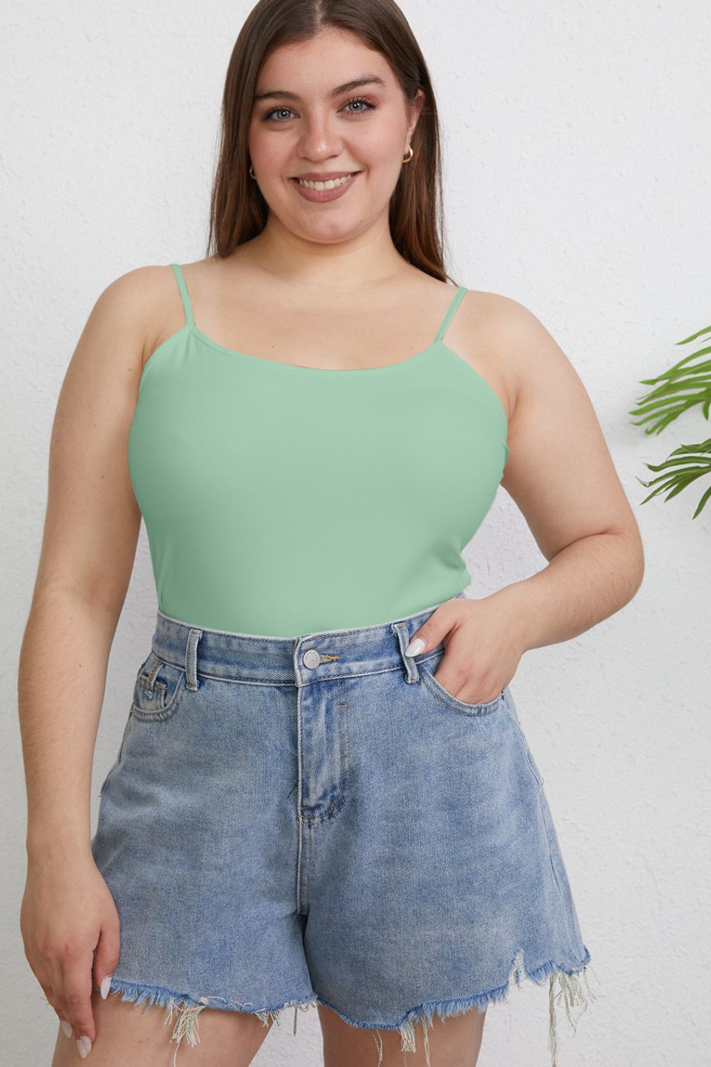 Plus size model in gum leaf Winetta Slim Cami, round neck and flattering slim cut.