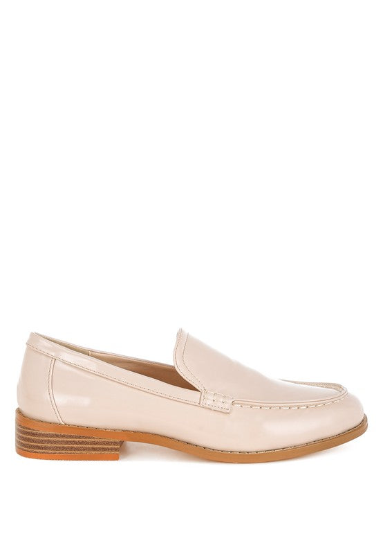 Lateral side view of Beige Corleone Vegan Leather Loafers with sleek stitch detail and slip-on style.