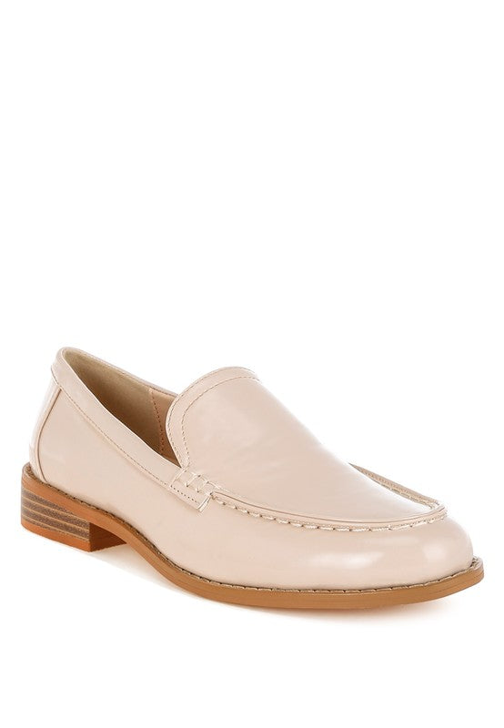 Front angle of Beige Corleone Vegan Leather Loafers with stacked heel and stitch detailing.