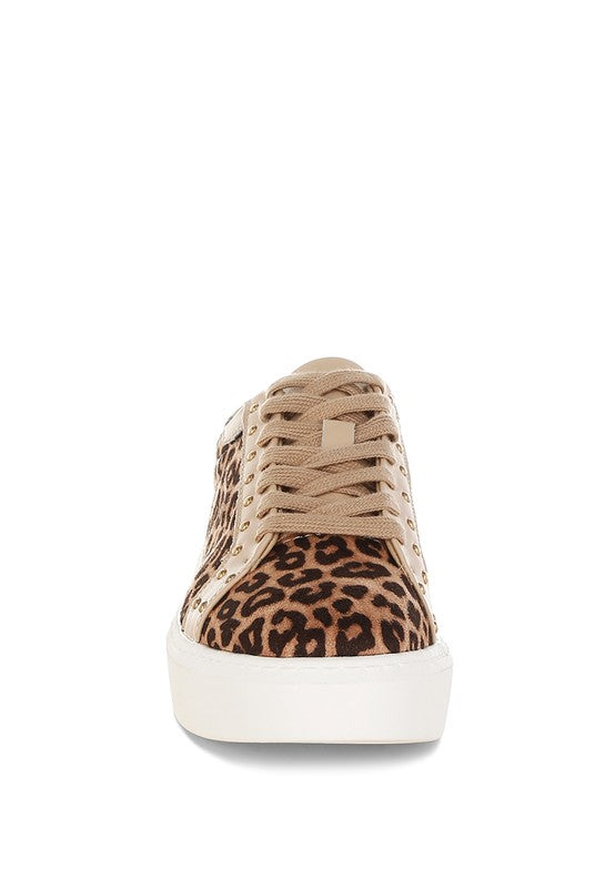 Top view of beige leopard print leather sneakers with lace-up design and studded round toe detail.