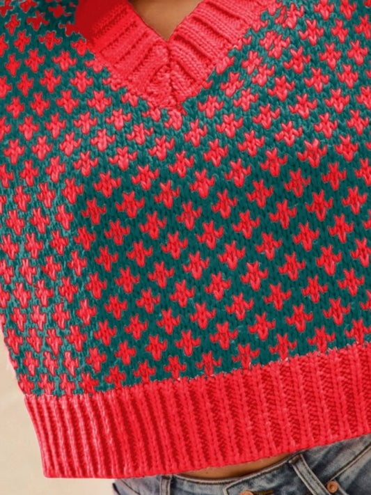 Detail shot hunter green and red Chloe Sweater showcasing V-neckline, ribbed knit trim, oversized relaxed fit, cozy soft fabric.