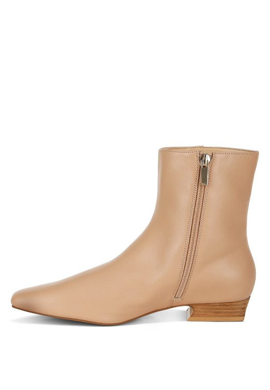 Obita Leather Ankle Boots in beige showing zipper closure.