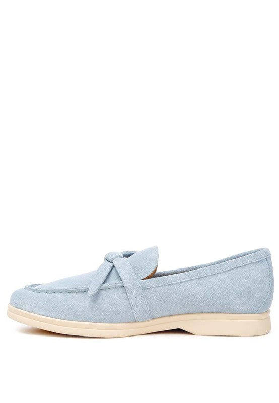 Nautica baby blue suede loafers side angle showing vamp and sole.