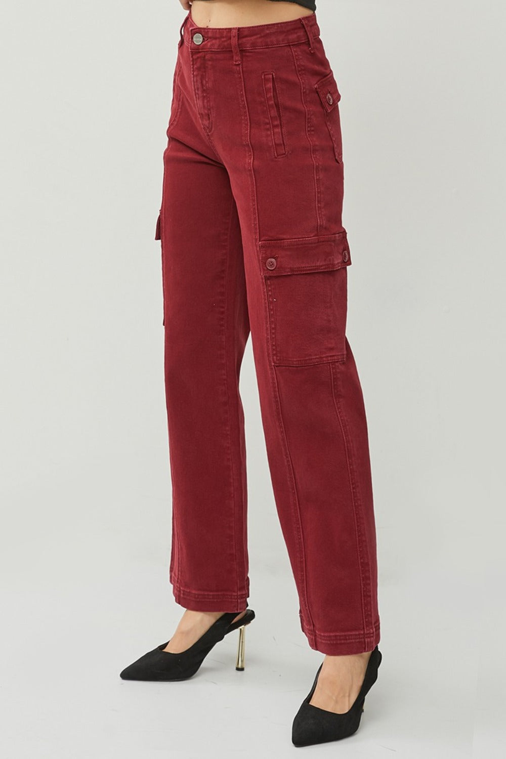 Side view of Rafaela wide leg cargo jeans in wine highlighting high rise and roomy cargo pockets.