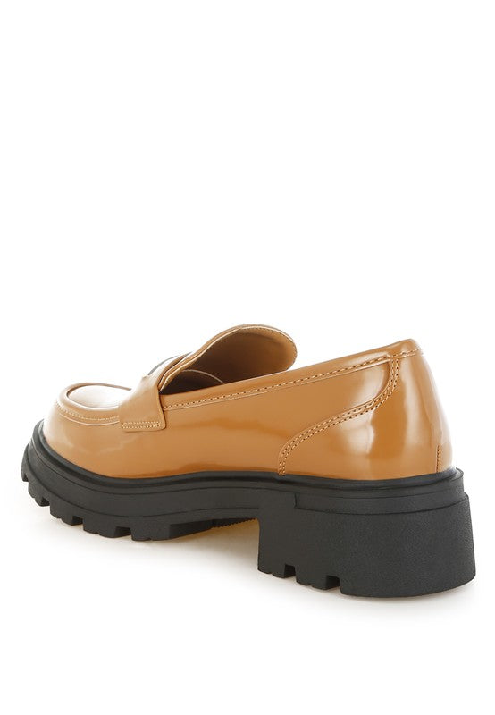 Back side view of Tan Gleam Stride Chunky Loafers highlighting lug sole and 1.5-inch block heel.