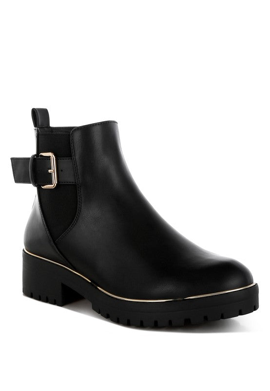 Front angle view of black Antorin chunky buckle ankle boots with round toe and platform sole.